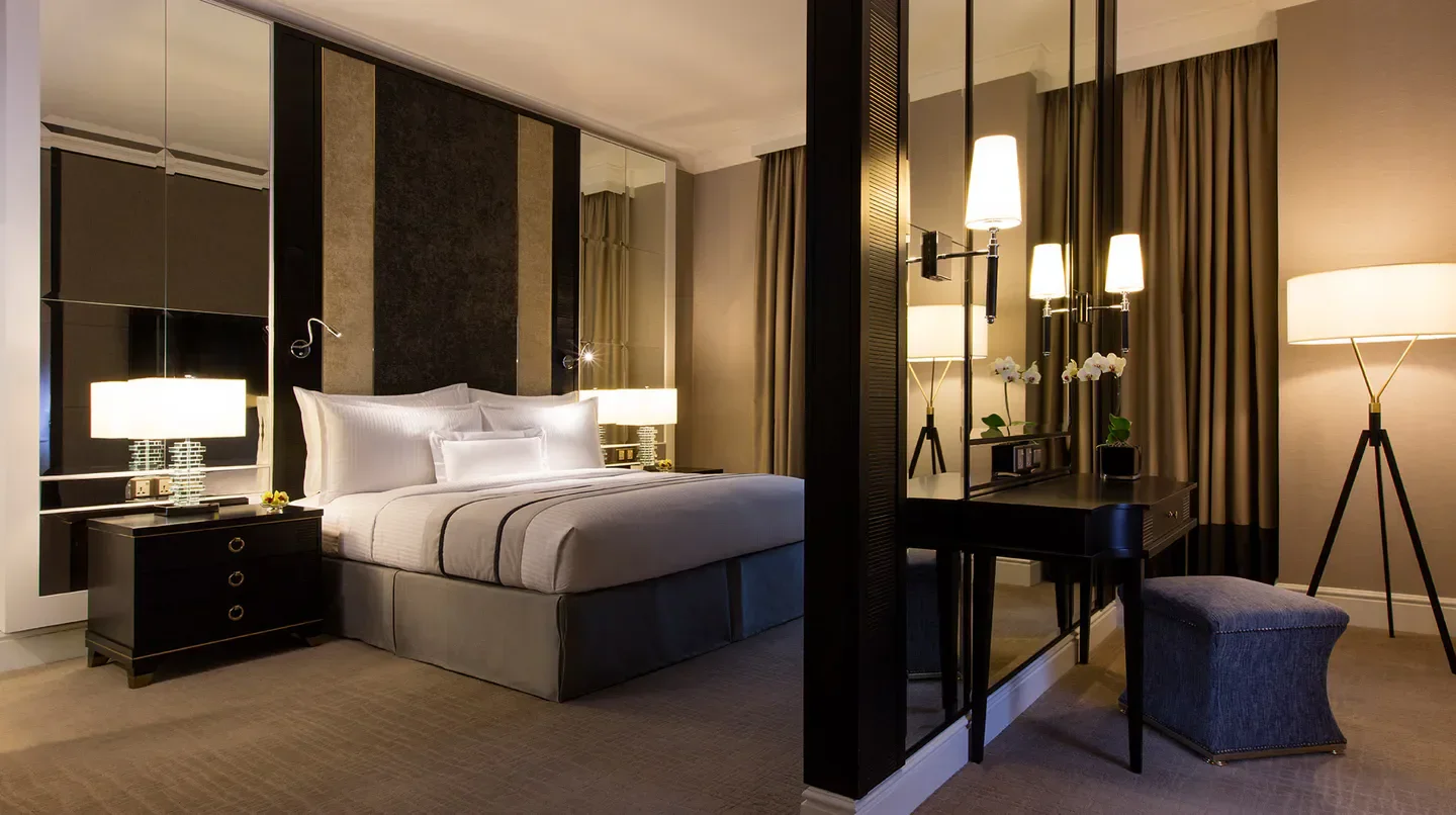 Luxurious bedroom at The Ritz-Carlton, Kuala Lumpur, offering comfort in Kuala Lumpur.