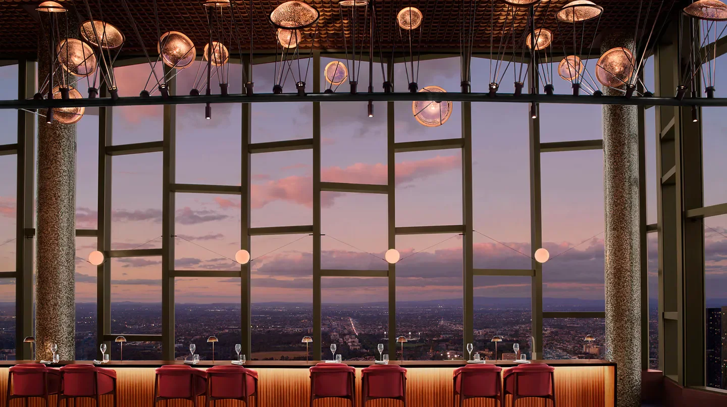 Rooftop bar at The Ritz-Carlton, Melbourne, with sunset views over Melbourne.