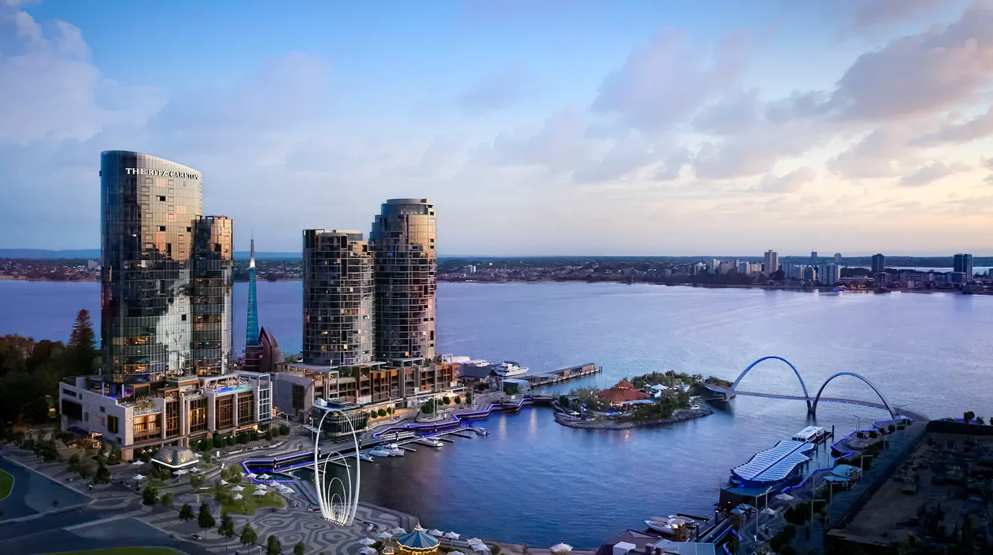 Aerial view of The Ritz-Carlton, Perth, showcasing the city's skyline at dusk.