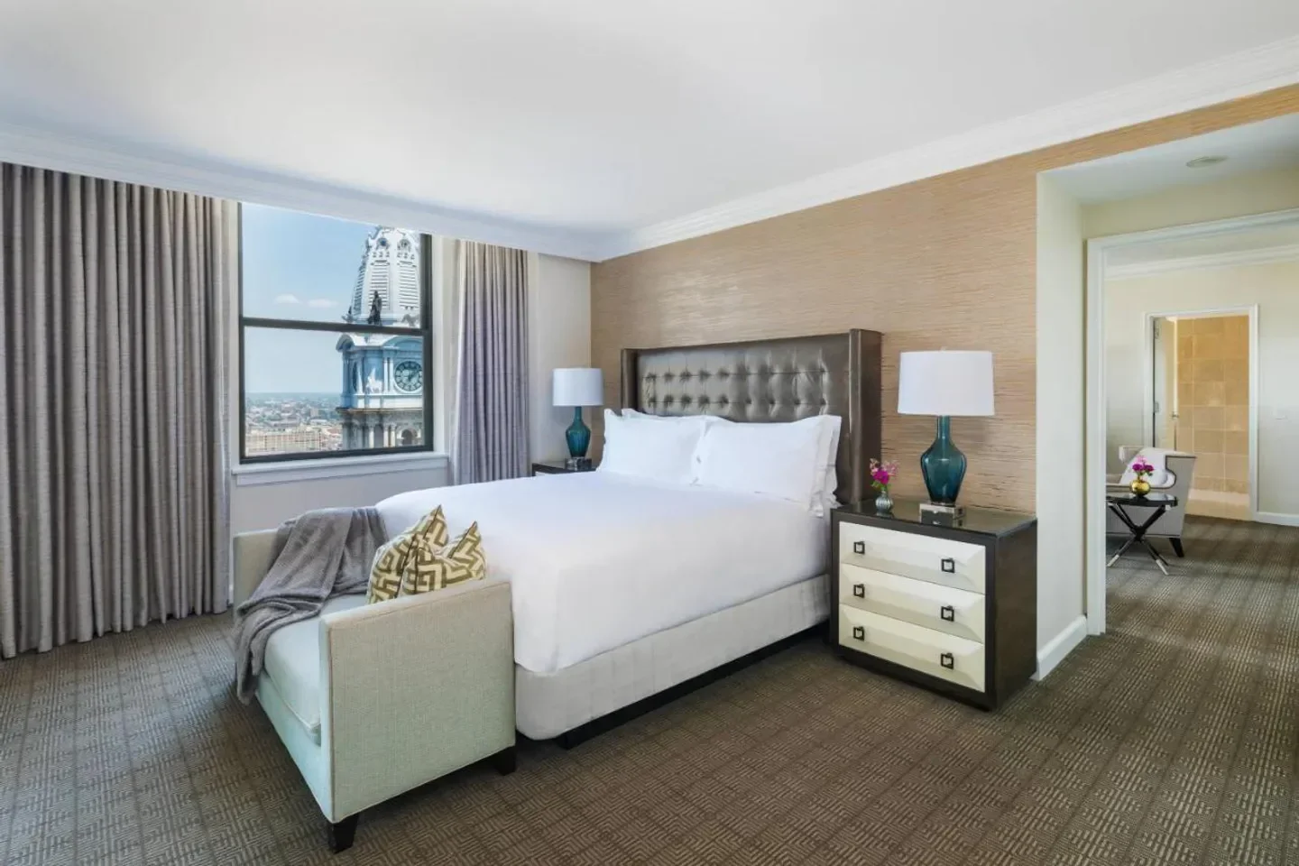 Elegant bedroom at The Ritz-Carlton, Philadelphia, featuring city views of Philadelphia.