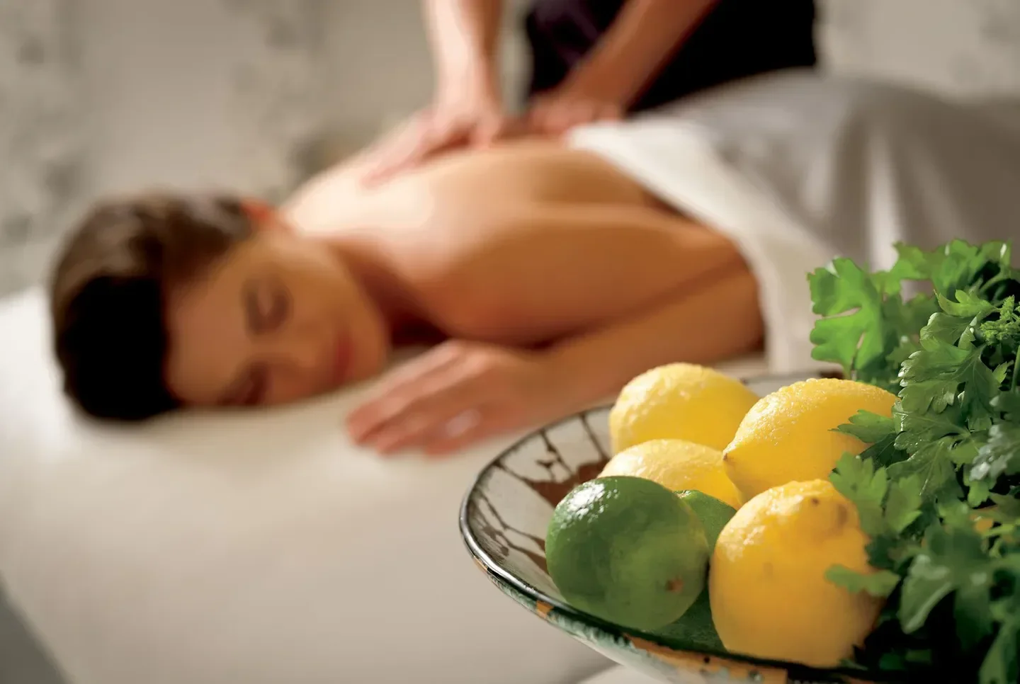 Relaxing massage at The Ritz-Carlton Spa, Fort Lauderdale, with citrus and fresh herbs.