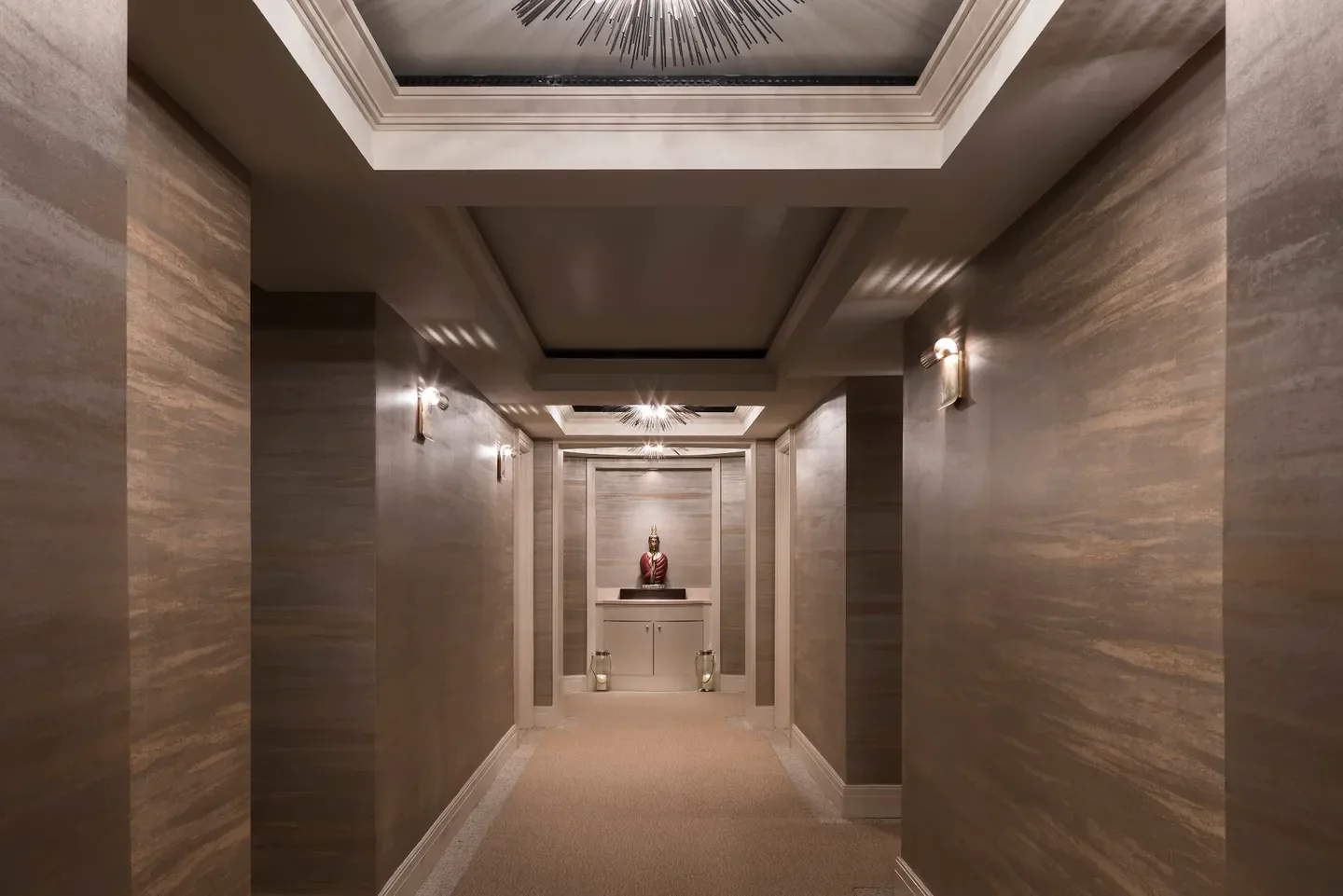 Interior hallway at The Ritz-Carlton Spa, South Beach, Miami Beach with a Buddha statue.