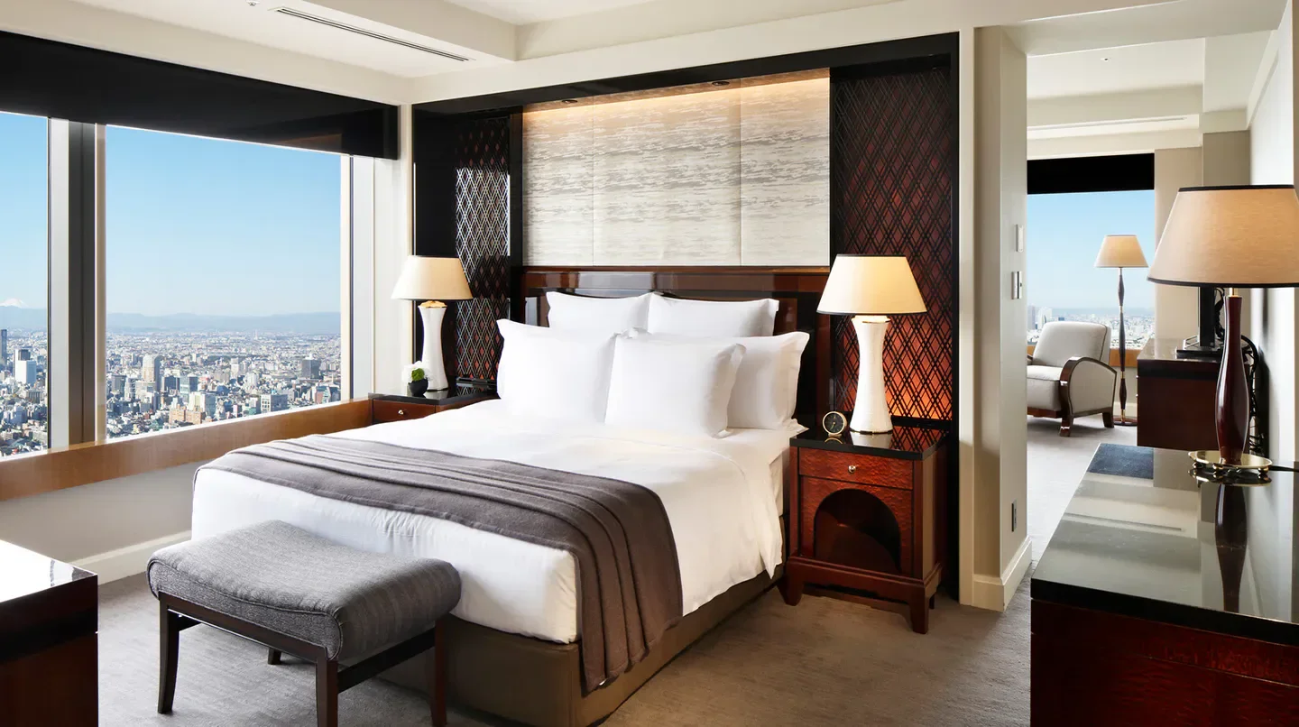 Luxurious suite at The Ritz-Carlton, Tokyo, overlooking the stunning cityscape of Tokyo.