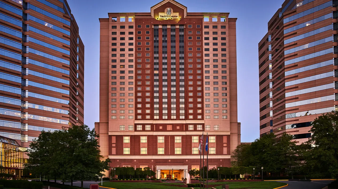 Exterior view of The Ritz-Carlton, Tysons Corner in Washington, D.C. at dusk.