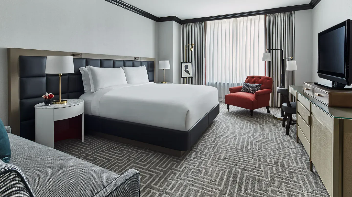 Cozy bedroom at The Ritz-Carlton, Washington, D.C., featuring a comfortable king-size bed in Washington.