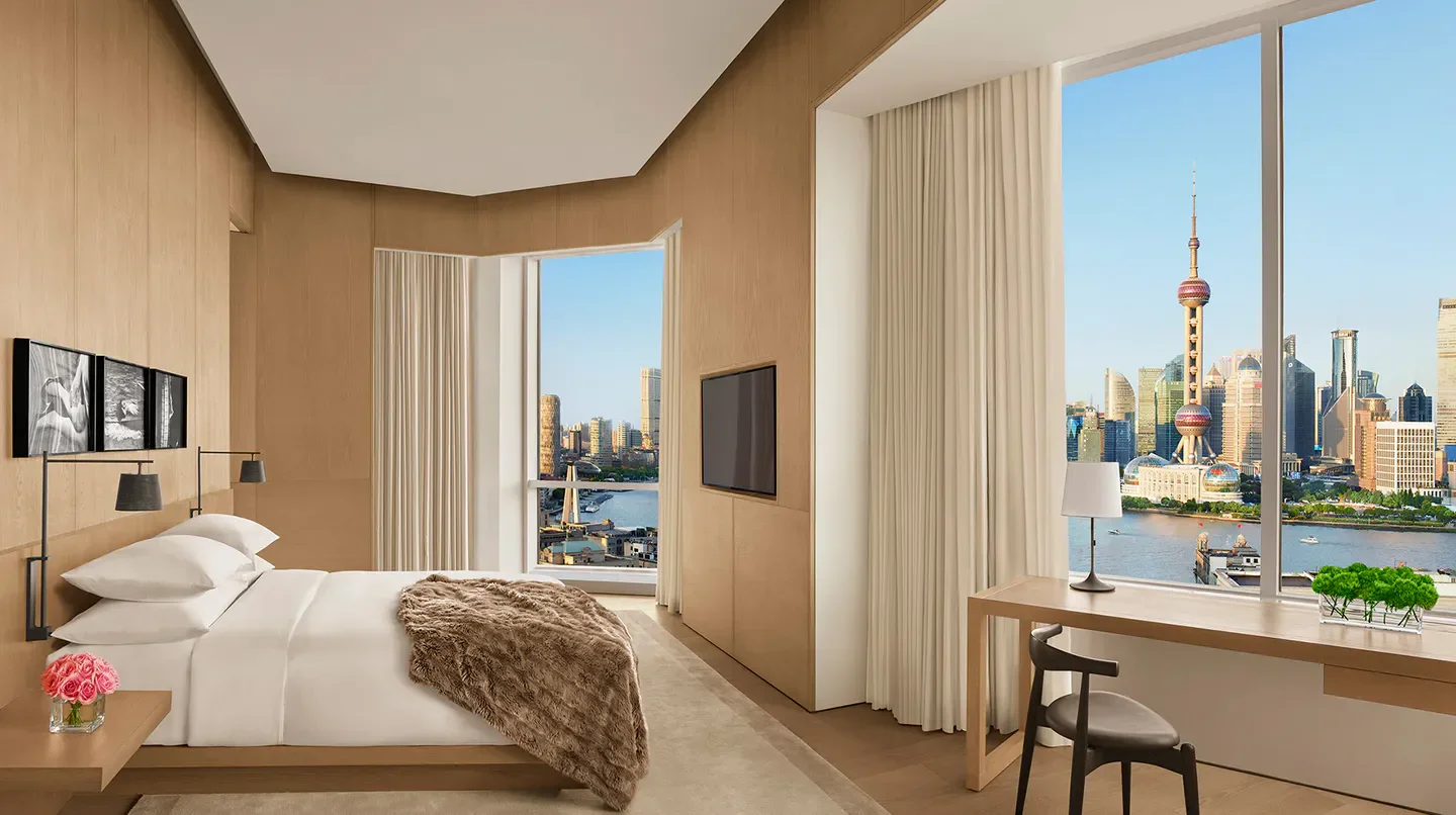 The Shanghai EDITION hotel room with city view, overlooking Shanghai skyline.