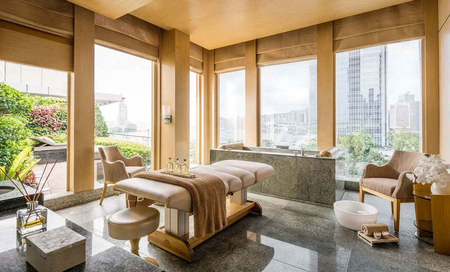 The Spa at Four Seasons Hotel Hong Kong spa room with city views in Hong Kong.