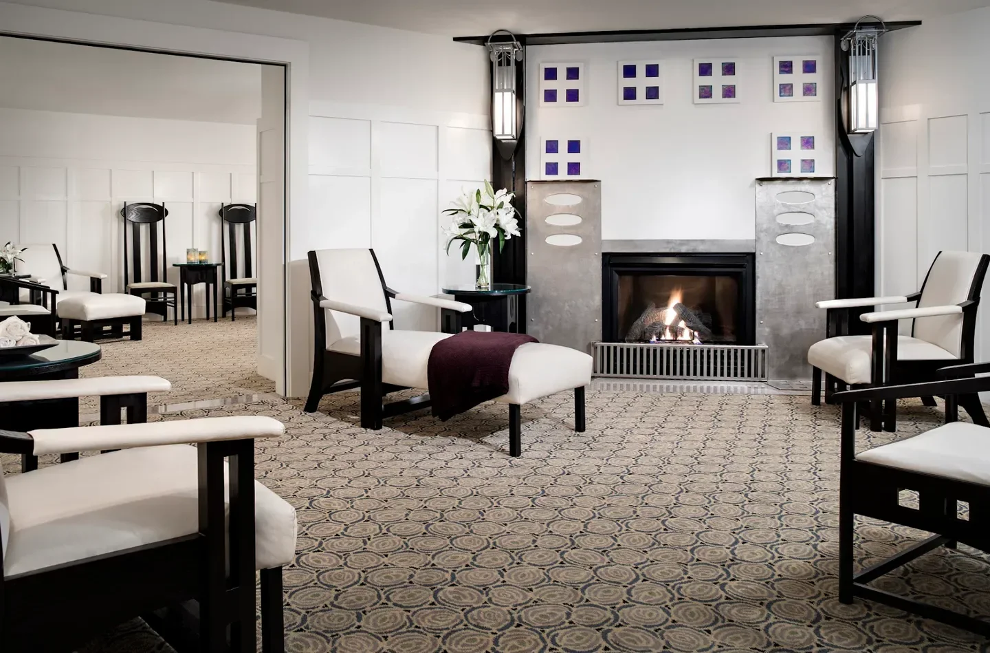 Cozy relaxation area at The Spa at Torrey Pines in San Diego with fireplace