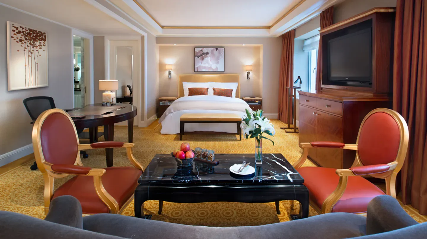 Luxurious suite at The St. Regis Beijing. Elegant bedroom in Beijing hotel with stylish decor.