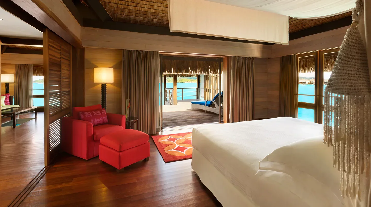 Bedroom with a view at The St. Regis Bora Bora Resort in Bora Bora, French Polynesia.