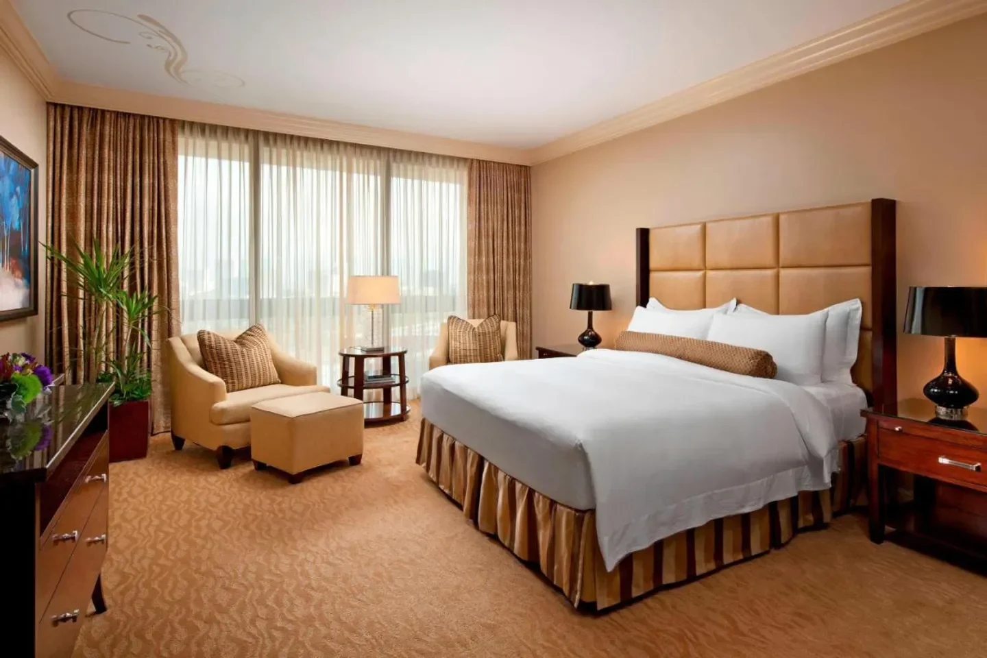 Cozy bedroom at The St. Regis Houston, featuring a comfortable bed in Houston.