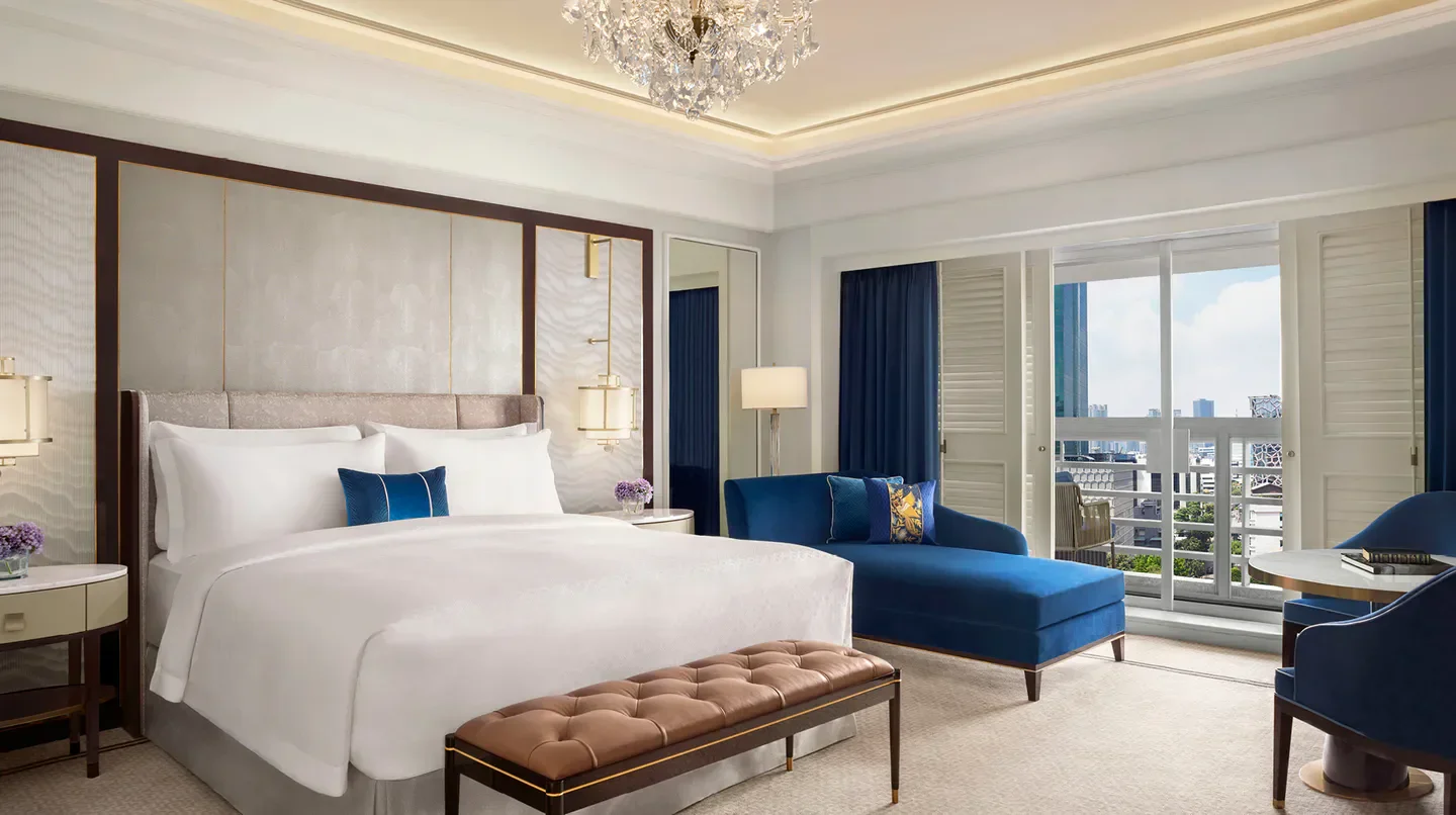 Luxury bedroom at The St. Regis Jakarta, featuring city views of Jakarta, Indonesia.