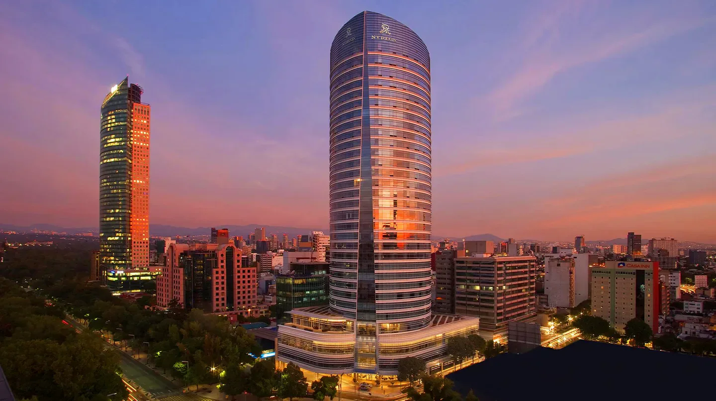 The St. Regis Mexico City at sunset in Mexico City with a beautiful cityscape view.
