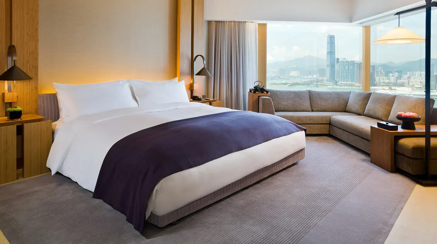 Luxury bedroom at The Upper House Hong Kong with city and harbor view