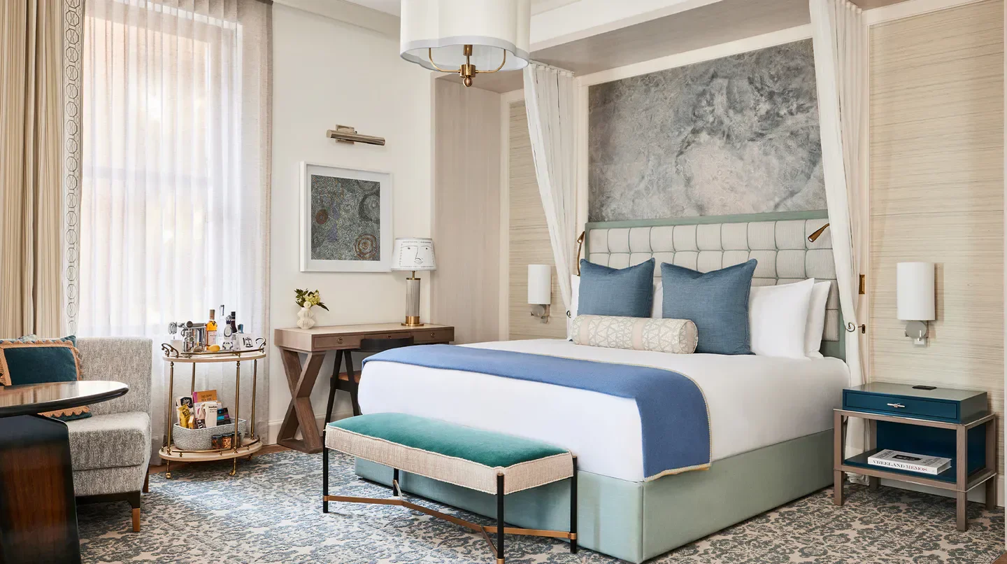 Luxury hotel room at The Wall Street Hotel in New York City with stylish decor.
