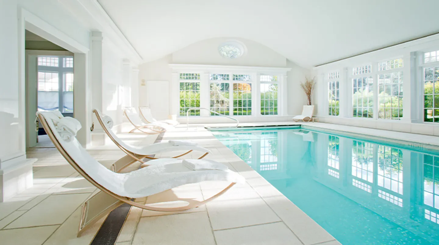 THE WELL at Mayflower Inn spa in Washington, featuring pool and relaxing lounge chairs.