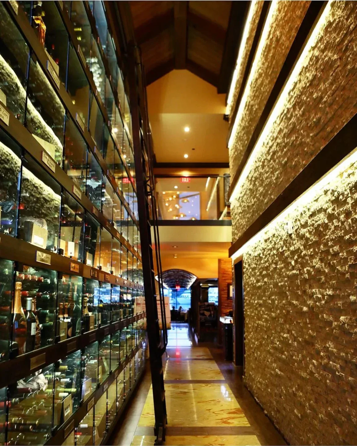Wine cellar inside The Winery Restaurant & Wine Bar - Tustin, Orange County with elegant ambiance.
