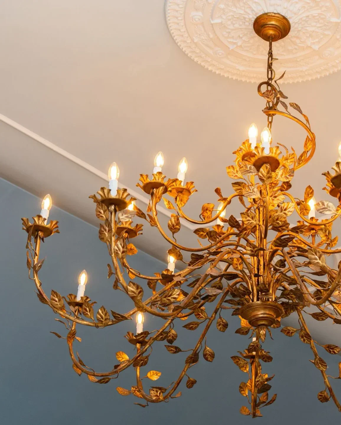 Ornate golden chandelier at The Yeatman restaurant in Porto, Portugal.