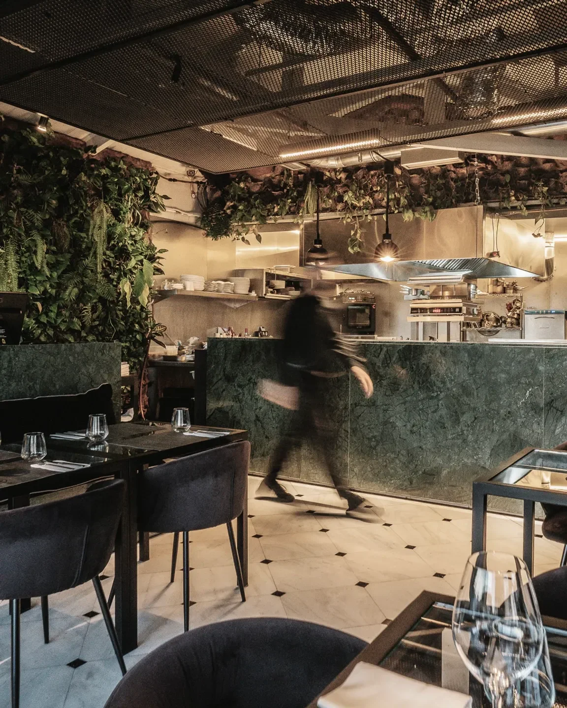 Interior of The Zillers Roof Garden restaurant in Athens, showcasing modern design and marble