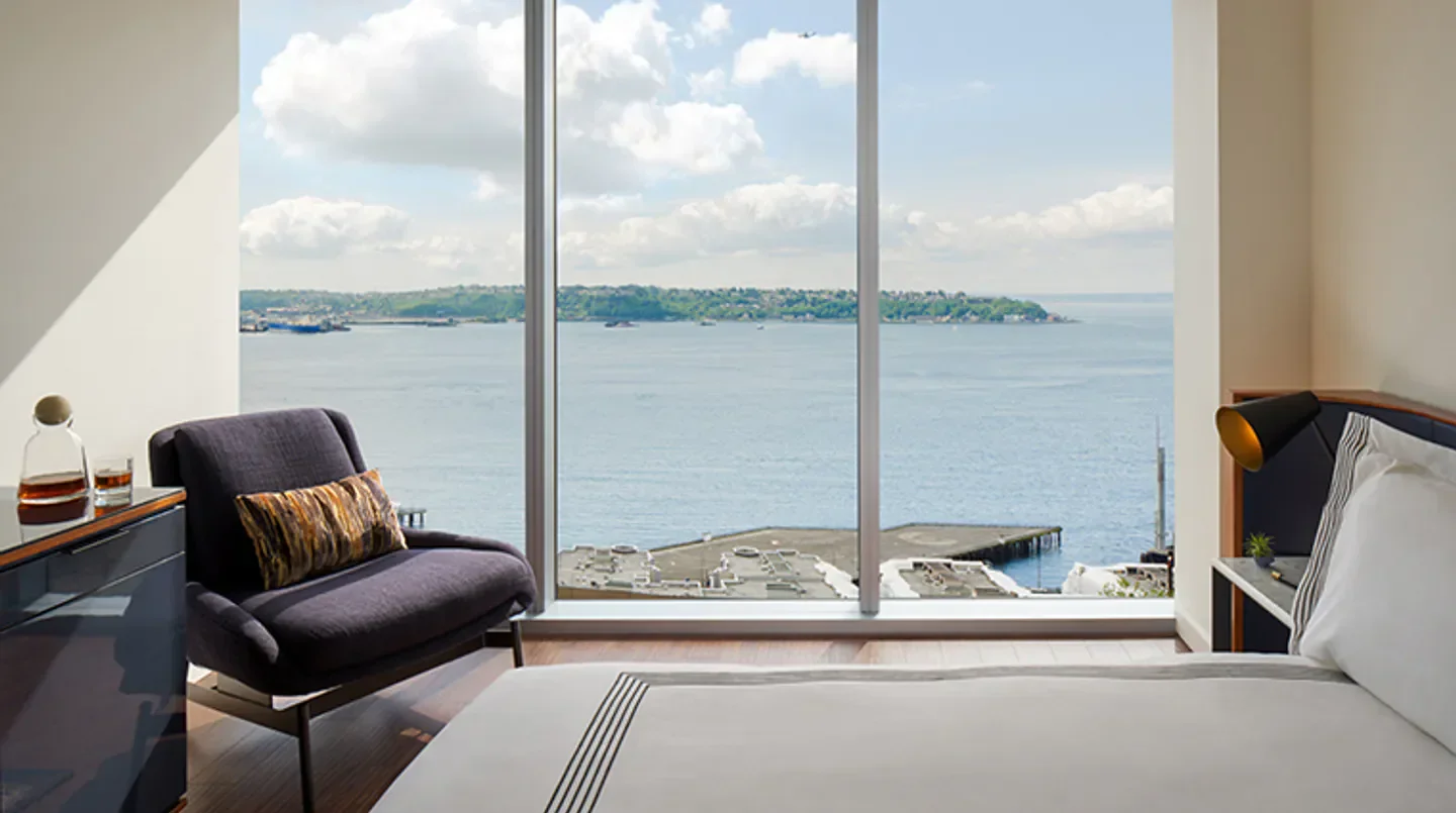 Thompson Seattle hotel room with scenic waterfront views of the city in Seattle.