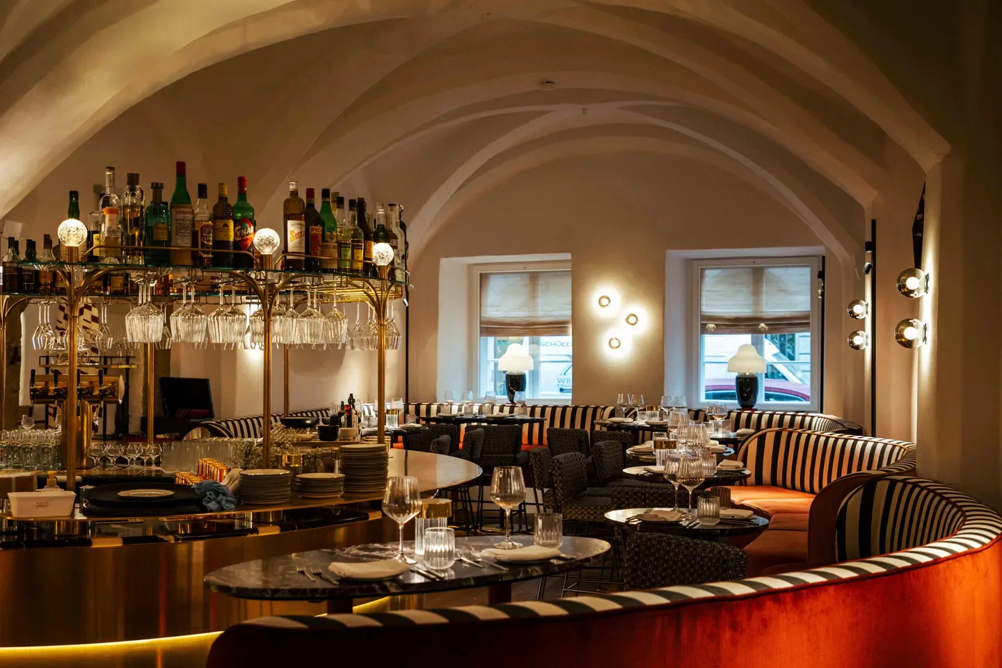 Interior of Tohru in der Schreiberei in Munich, with stylish seating and bar.