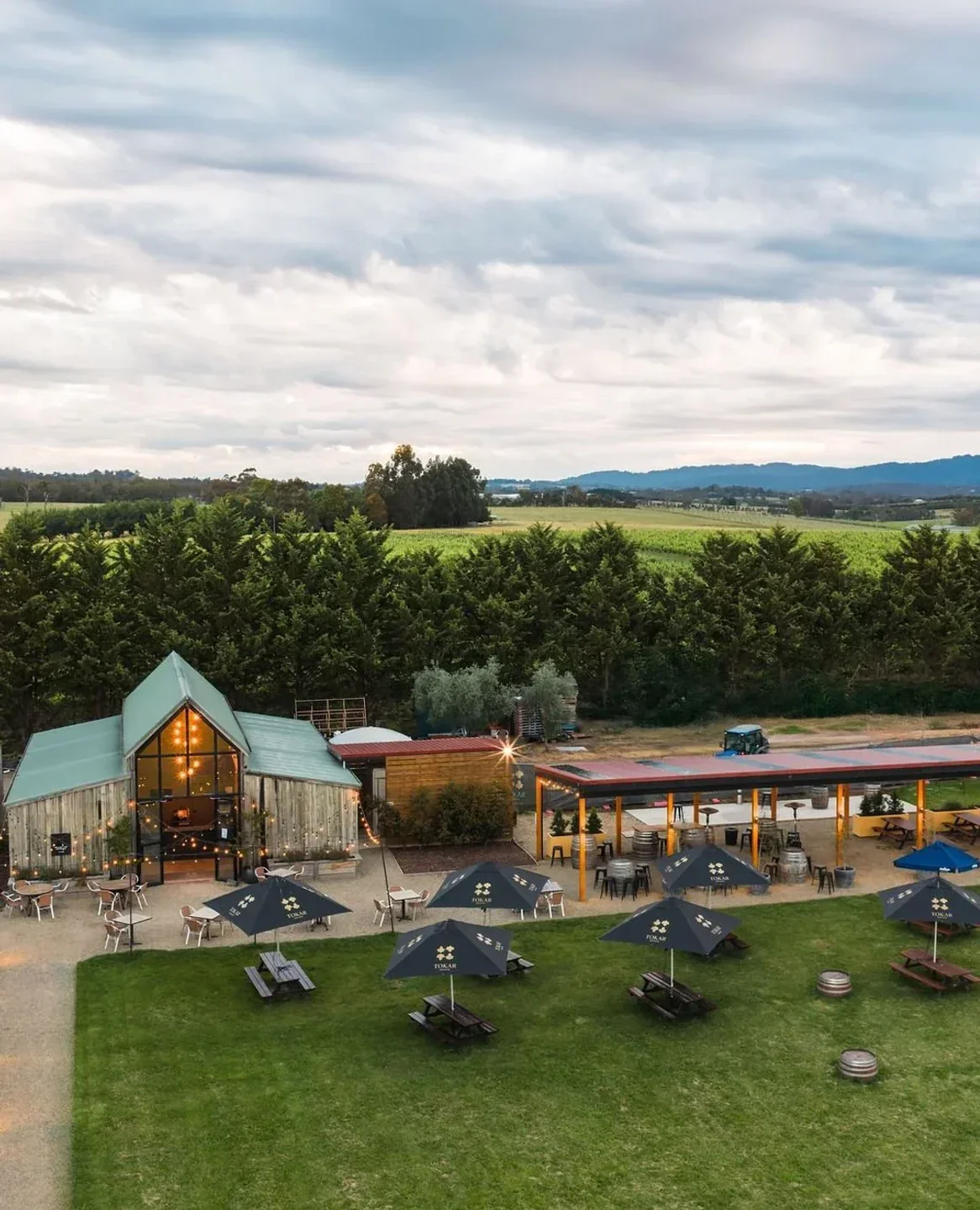 Exterior of Tokar Estate Restaurant in Yarra Valley with outdoor dining and scenic views