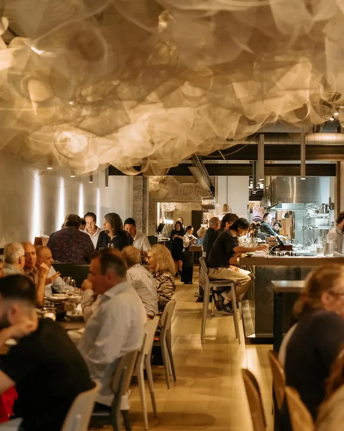 Dining room at Tonka restaurant in Melbourne, with unique cloud-like ceiling decor