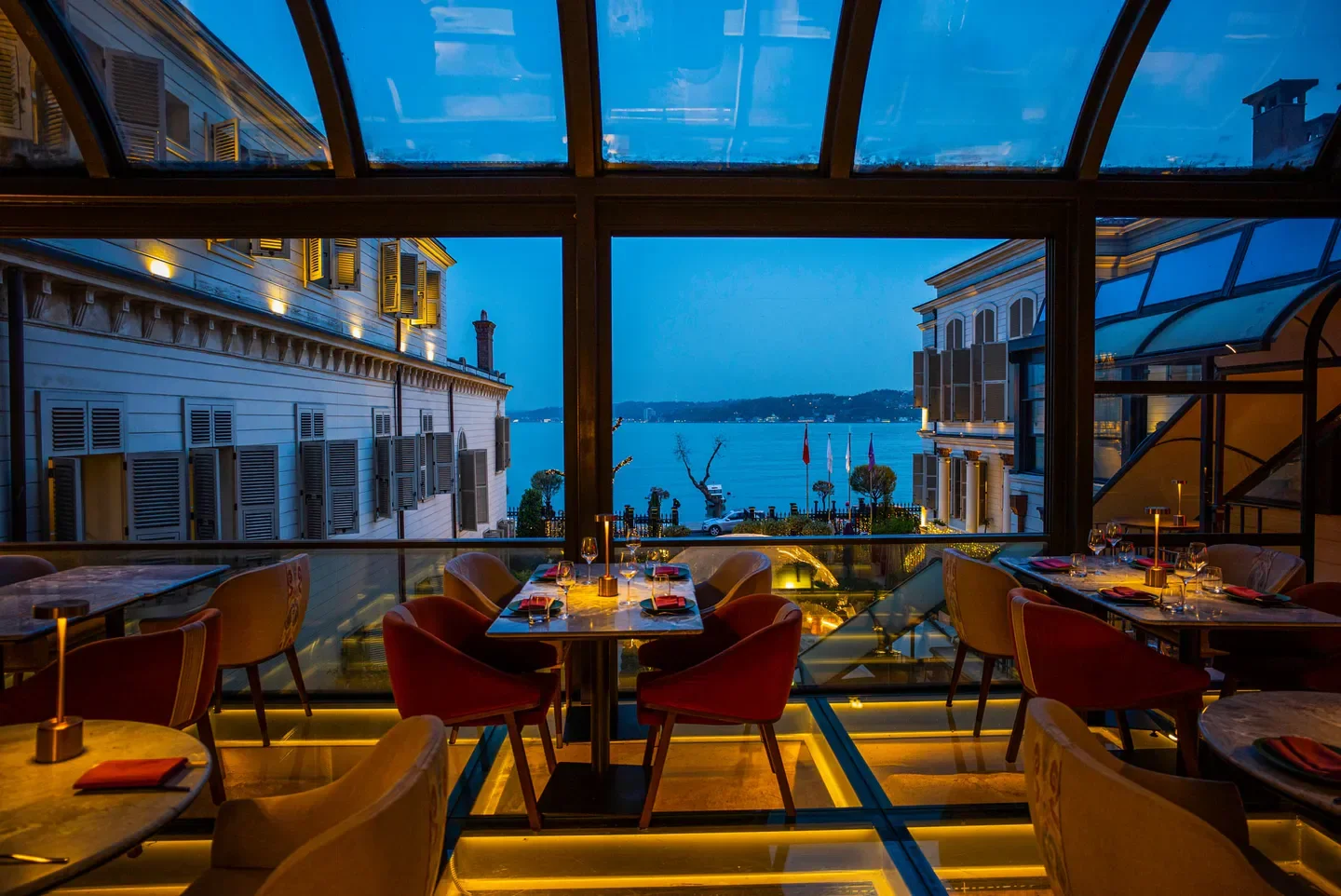 Toro Latin Gastro Bar in Istanbul with a scenic waterfront view at dusk.
