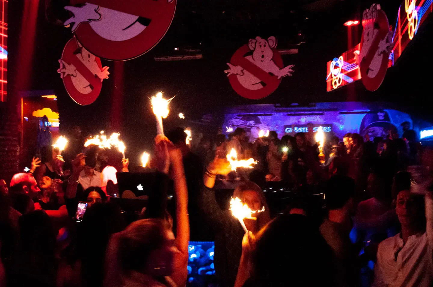 Sparkling party at Toy Room Rome, a vibrant nightclub with energetic crowd