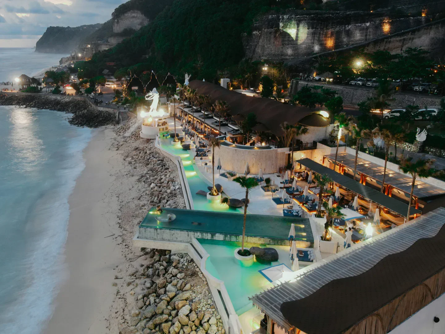 Aerial view of Tropical Temptation Beach Club in Bali with pool and ocean views.