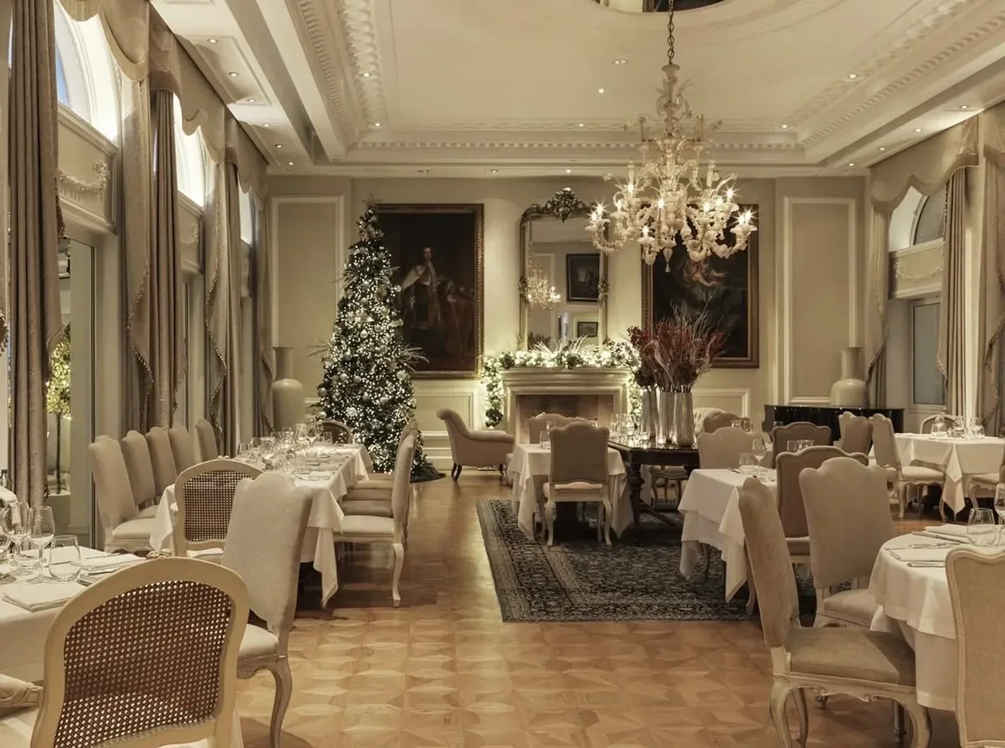Elegant dining room at Tudor Hall in Athens, Greece, with festive holiday decor.