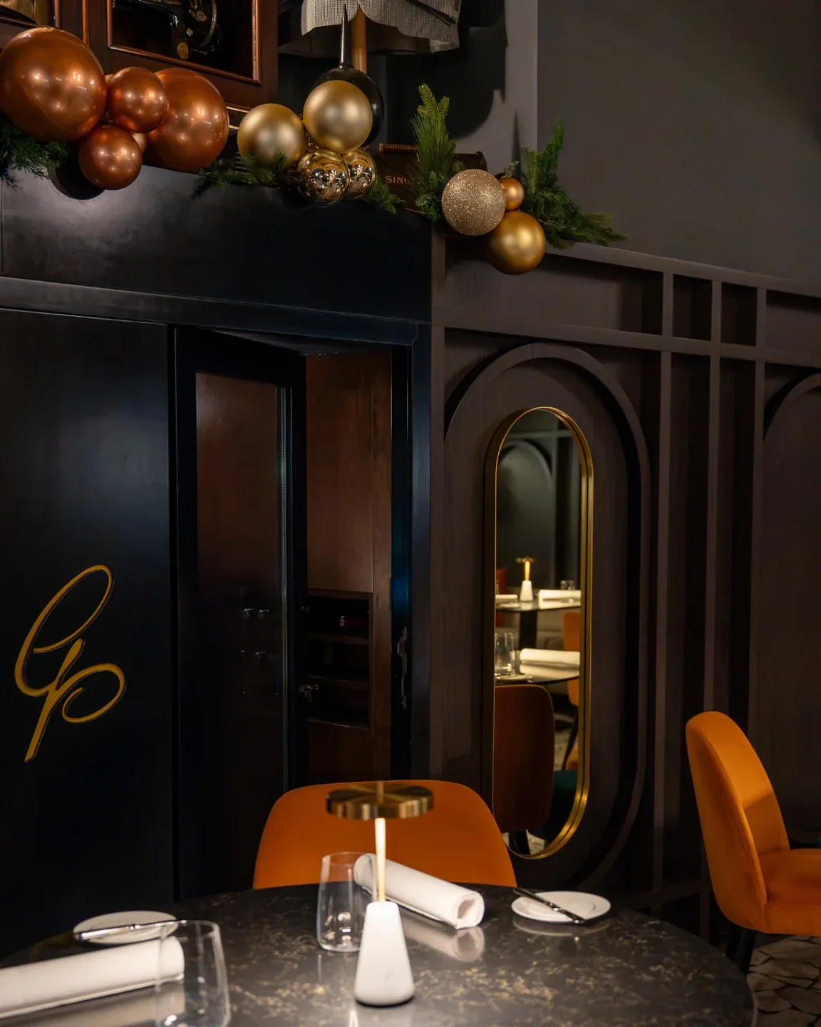 Interior of Under Grain restaurant in Valletta, Malta, showcasing elegant decor with modern design and cozy ambiance.