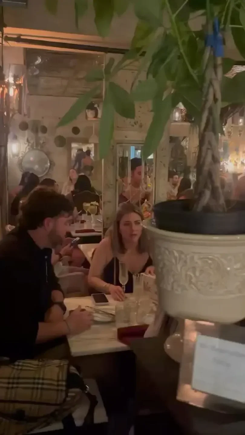 Verde Mesa restaurant interior in San Juan with diners and a decorative plant.