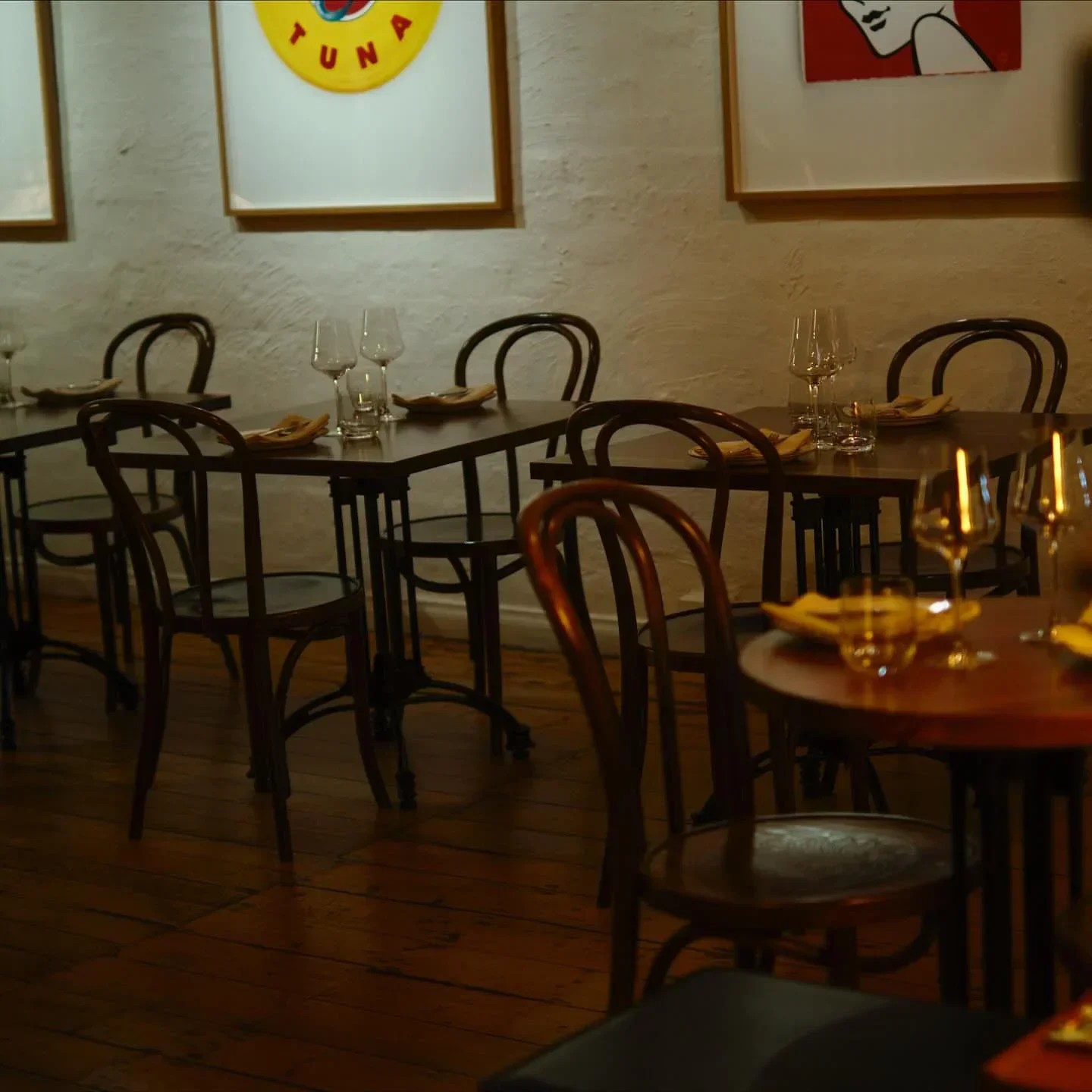 Interior of VEX restaurant in Melbourne, with tables set for dining and stylish decor.