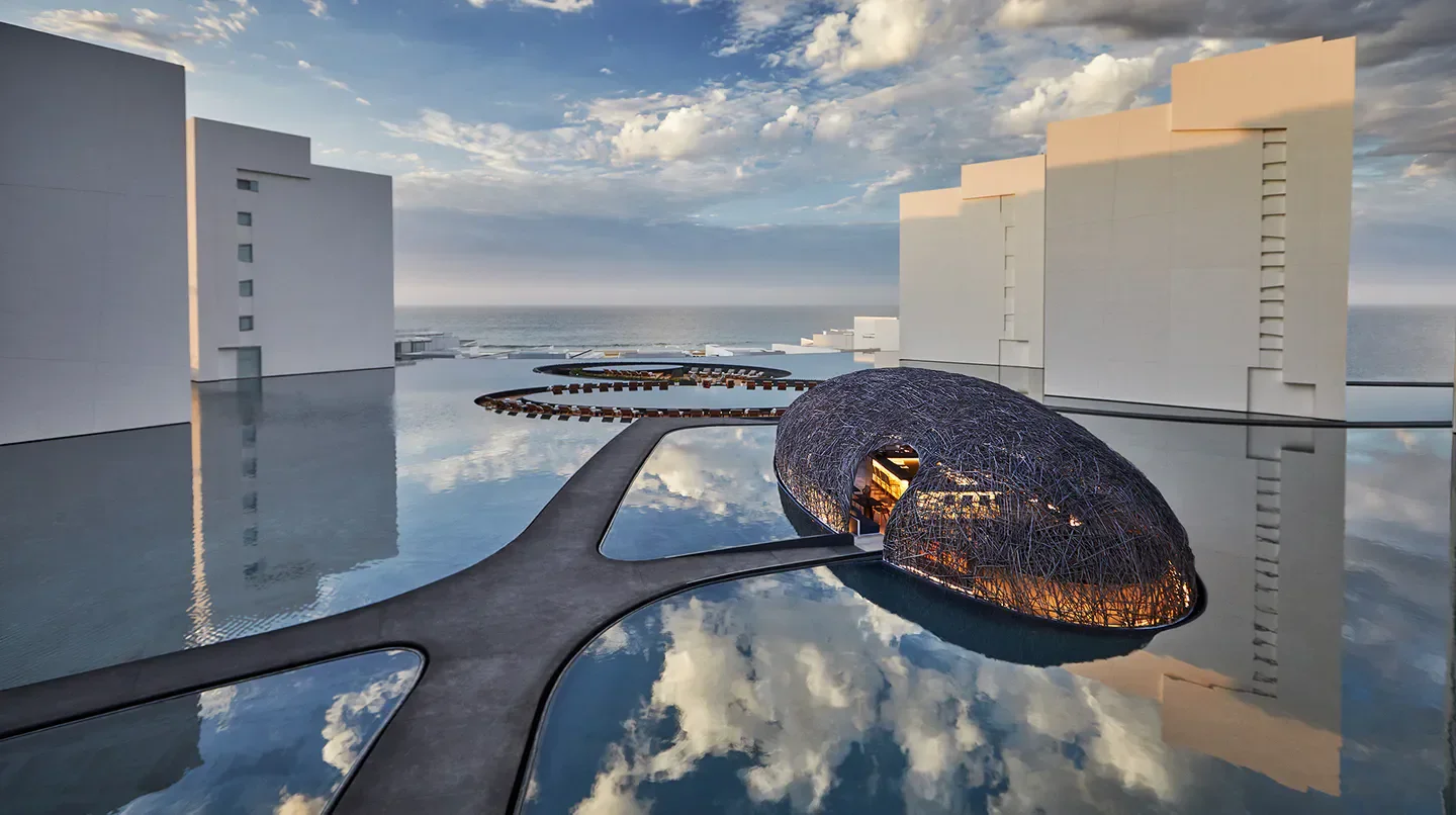 Modern architecture at Viceroy Los Cabos hotel in Cabo San Lucas with reflective pool