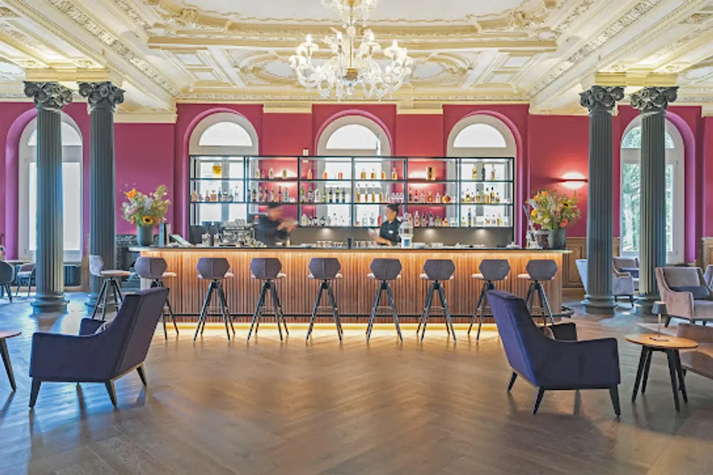 Interior of Vic's Bar in St. Moritz with a stylish bar and seating area.