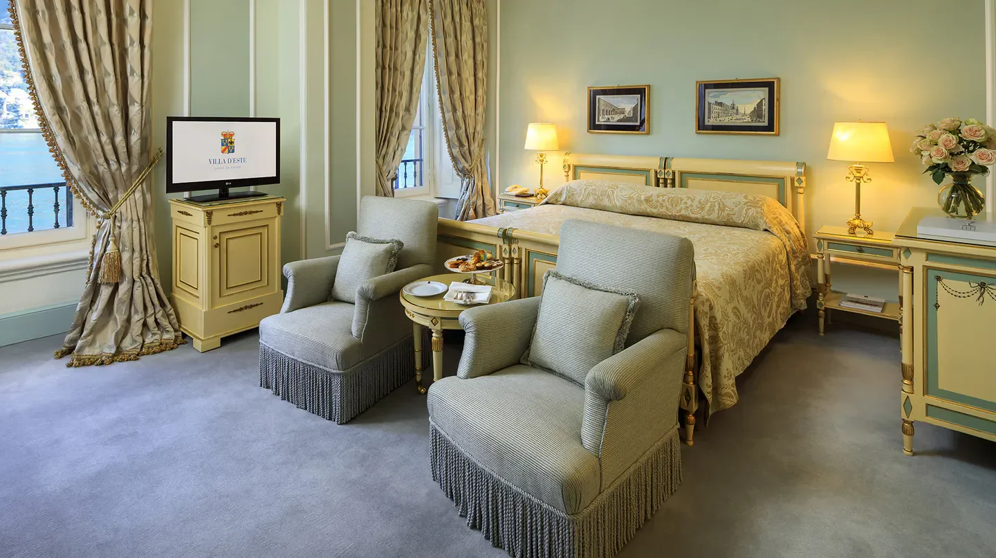 Elegant bedroom at Villa d’Este, Lago di Como, a luxury hotel in Rome, Italy.