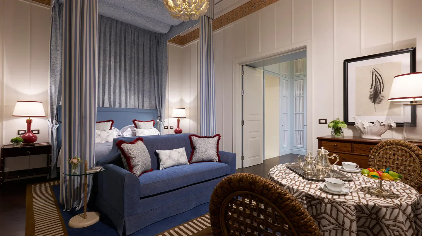 Elegant bedroom at Villa Igiea, A Rocco Forte Hotel in Sicily, featuring stylish design.