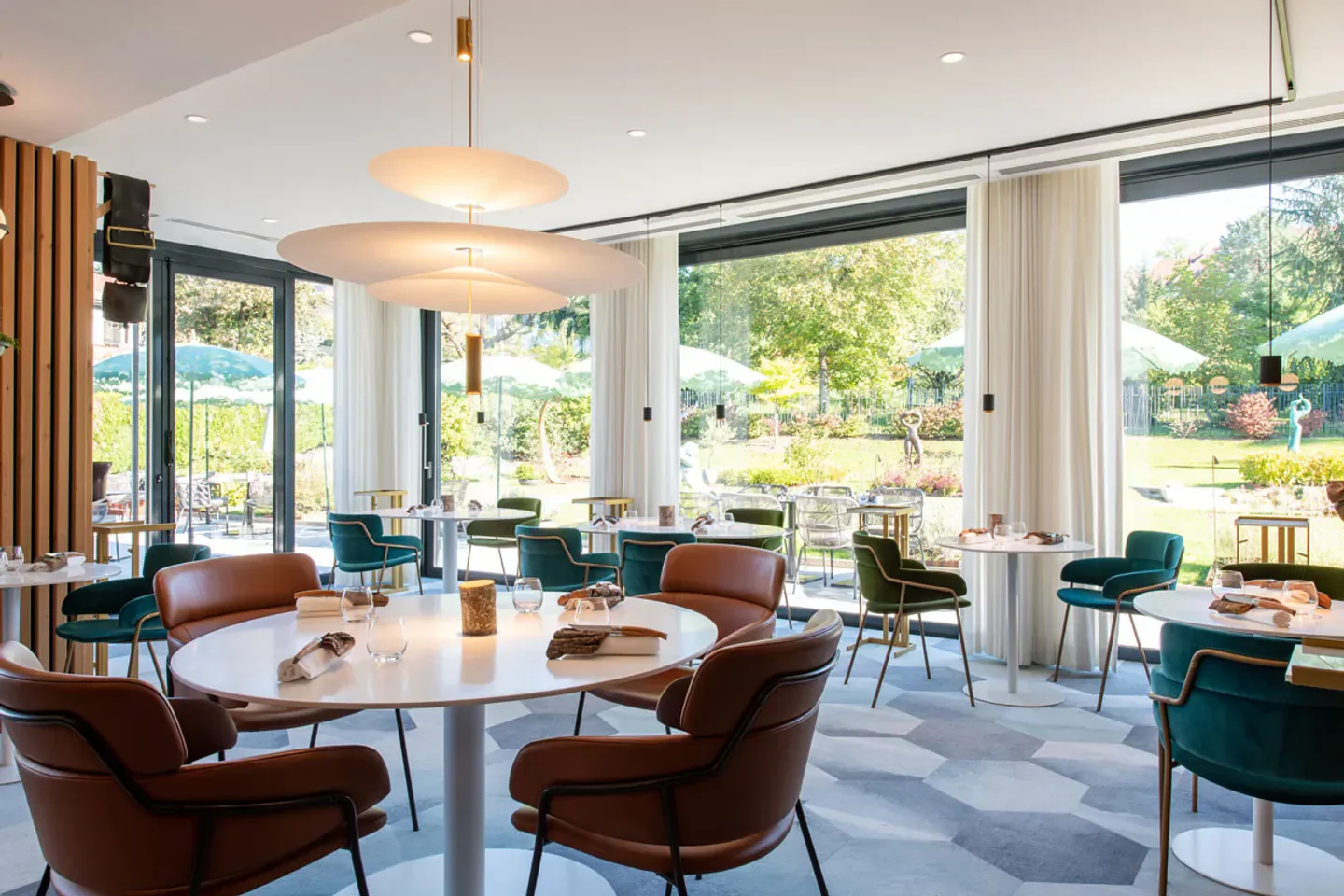 Elegant interior of Vincent Favre Félix restaurant in Annecy, featuring stylish decor and dining tables