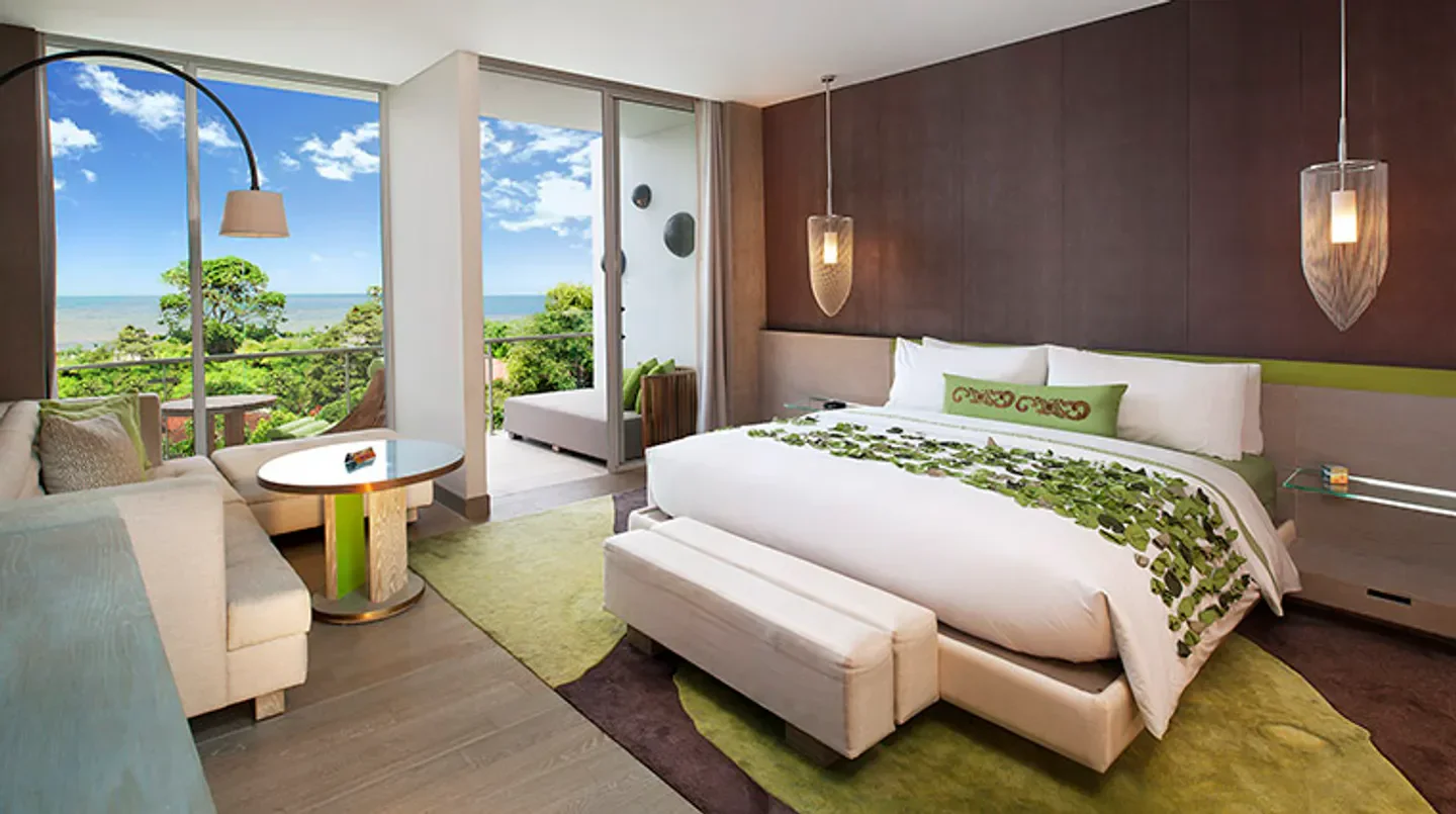 Luxury bedroom at W Bali – Seminyak, Bali, with ocean views and stylish decor.