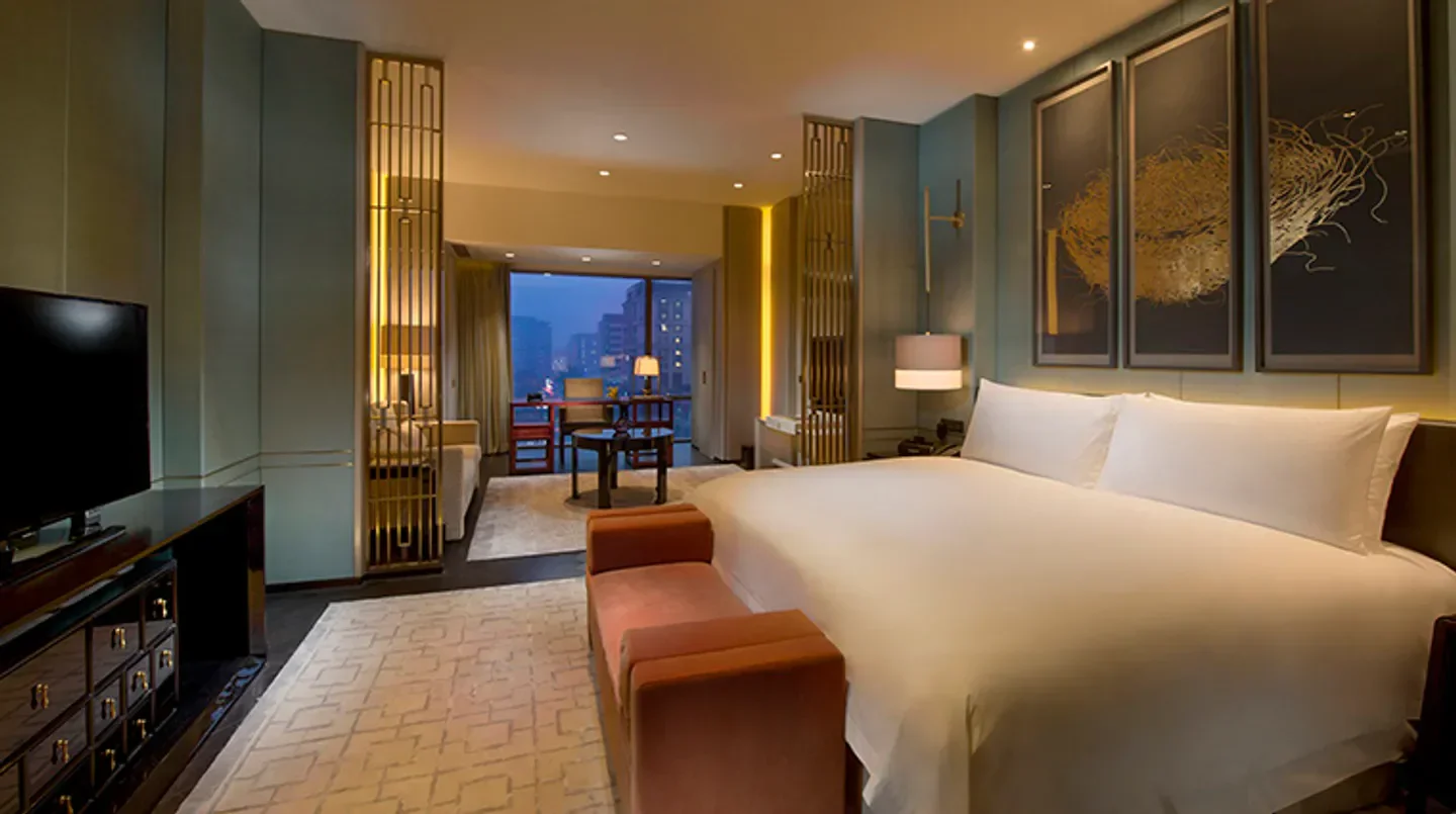 Luxury hotel room at Waldorf Astoria Beijing with city views in Beijing.