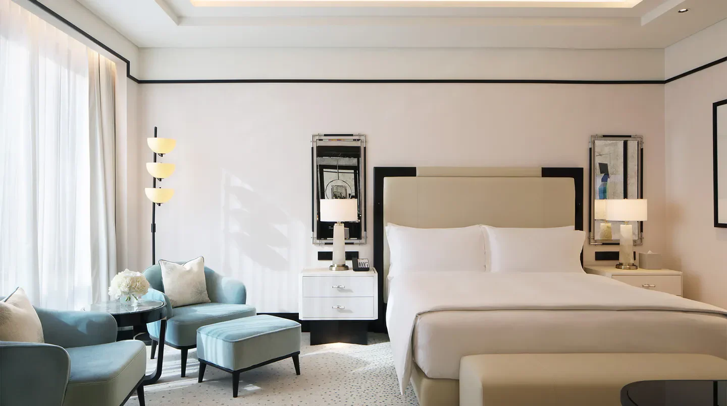 Elegant bedroom at Waldorf Astoria Doha West Bay, offering a luxurious Doha stay.