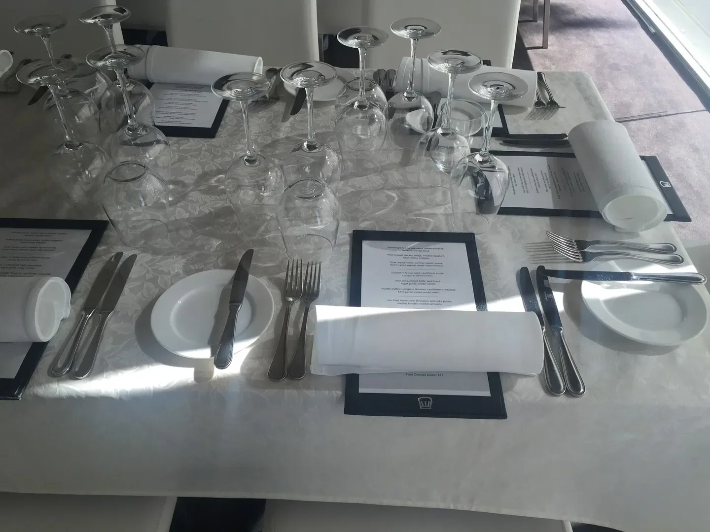 Table setting at Water's Edge Restaurant in Canberra, ready for a fine dining experience.
