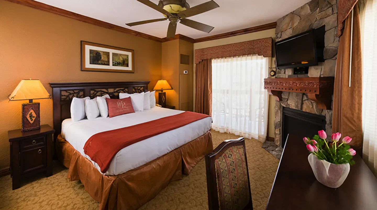 Cozy bedroom at Westgate Park City Resort & Spa in Park City, Utah, with fireplace.