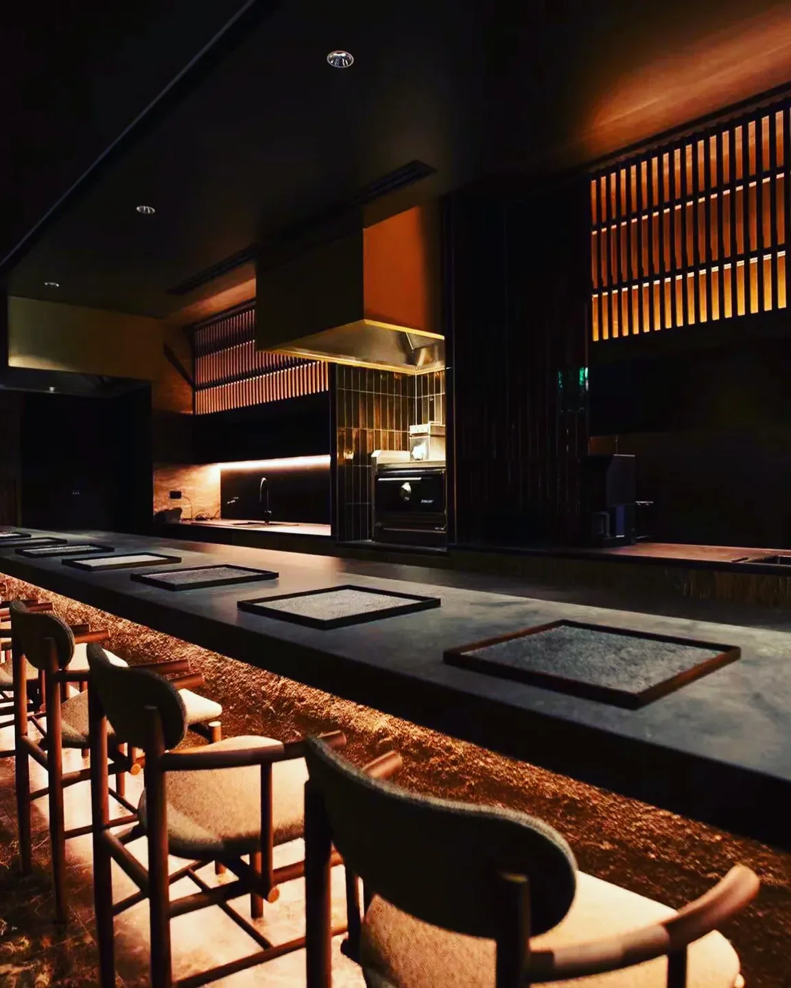 Interior of Yakikami restaurant in Melbourne featuring a stylish bar and seating area.