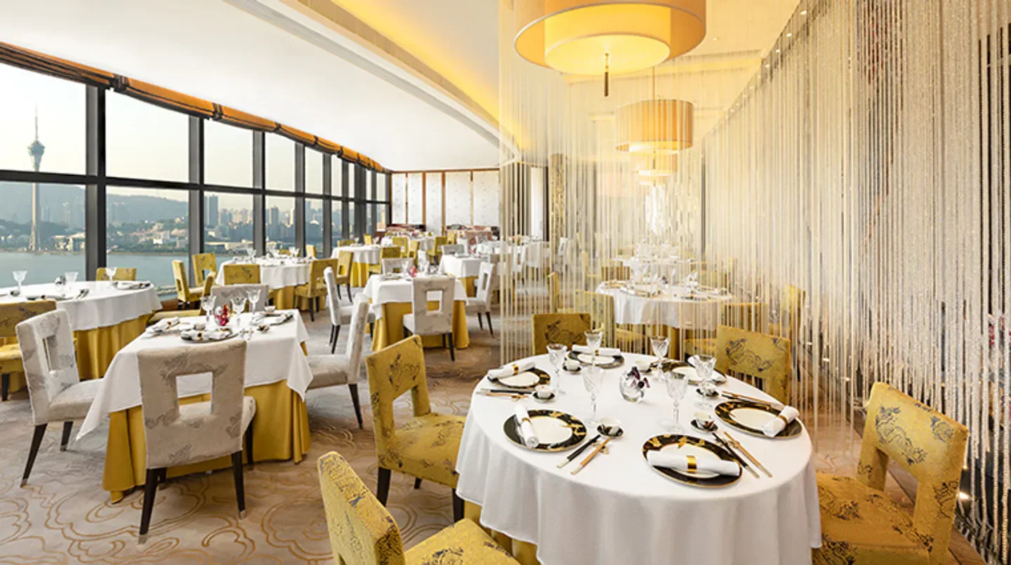 Elegant dining room at Ying at Altira Macau, offering stunning city views in Macau.