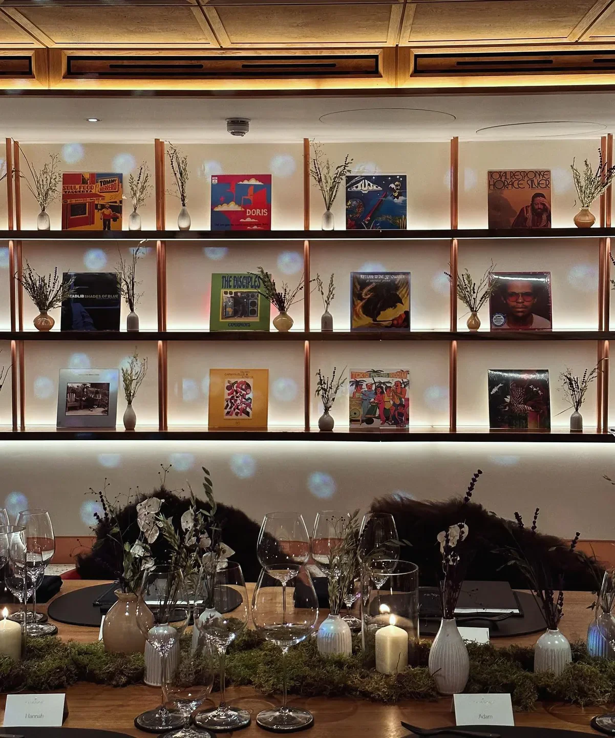 Dining experience at Ynyshir restaurant in Wales, with vinyl records and elegant table setting