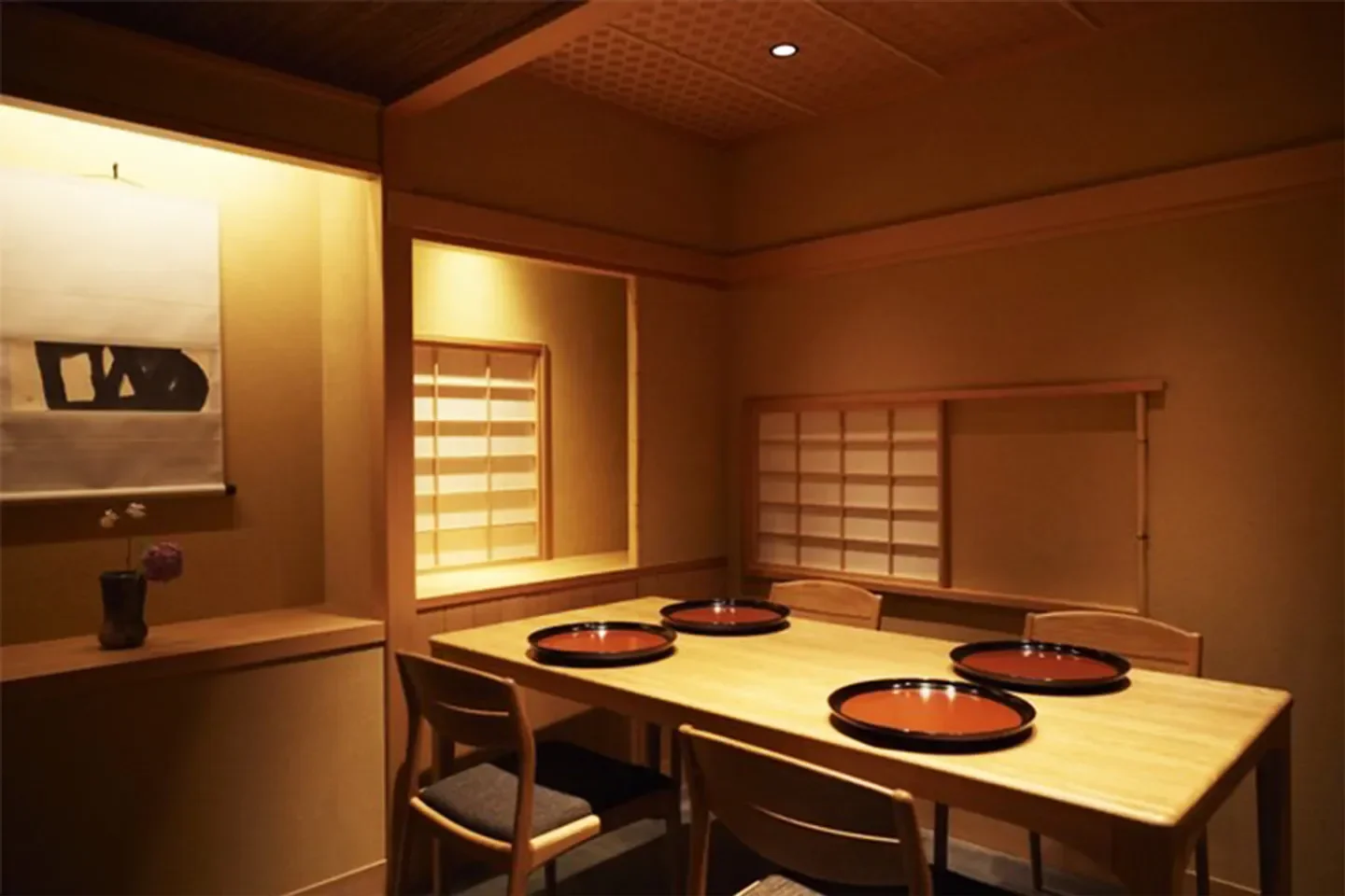 Cozy dining room at Yugen restaurant in Osaka, featuring traditional Japanese design