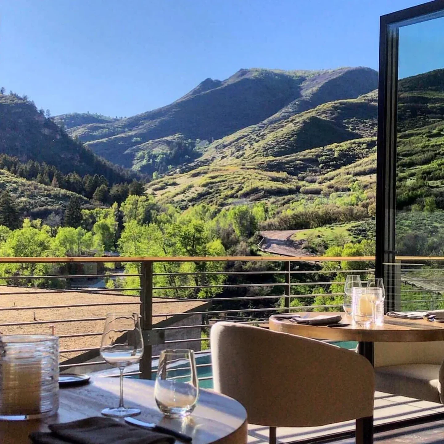 Scenic view from YUTA restaurant in Park City, overlooking lush mountains and valleys