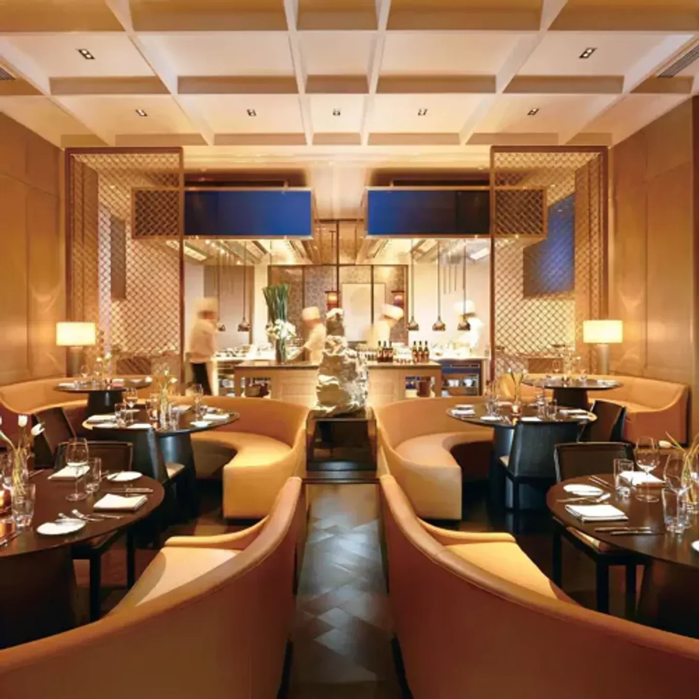 Elegant dining area at Zhiguan Courtyard restaurant in Beijing with inviting seating